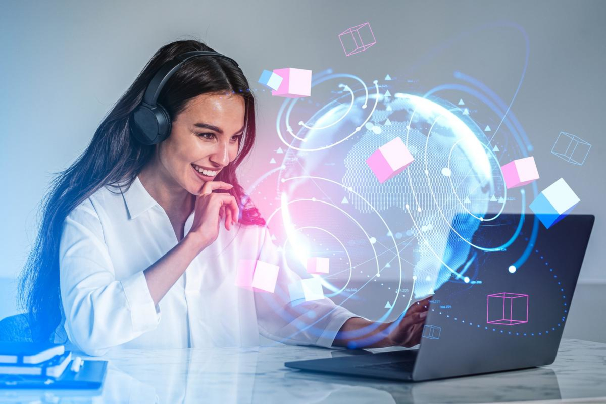 Woman working on laptop.