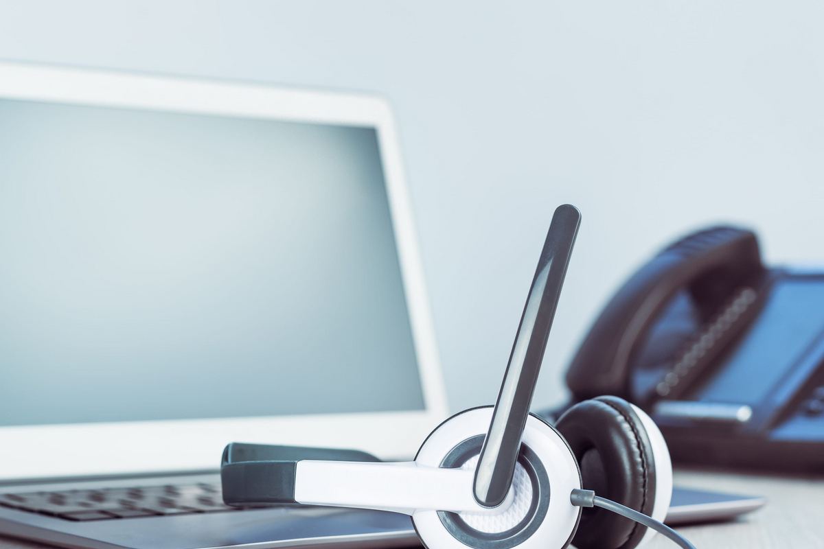 Call center agents handling business phone calls on a modern communications platform